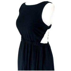 Dress Elasticated back waist With crossover back. Size: M